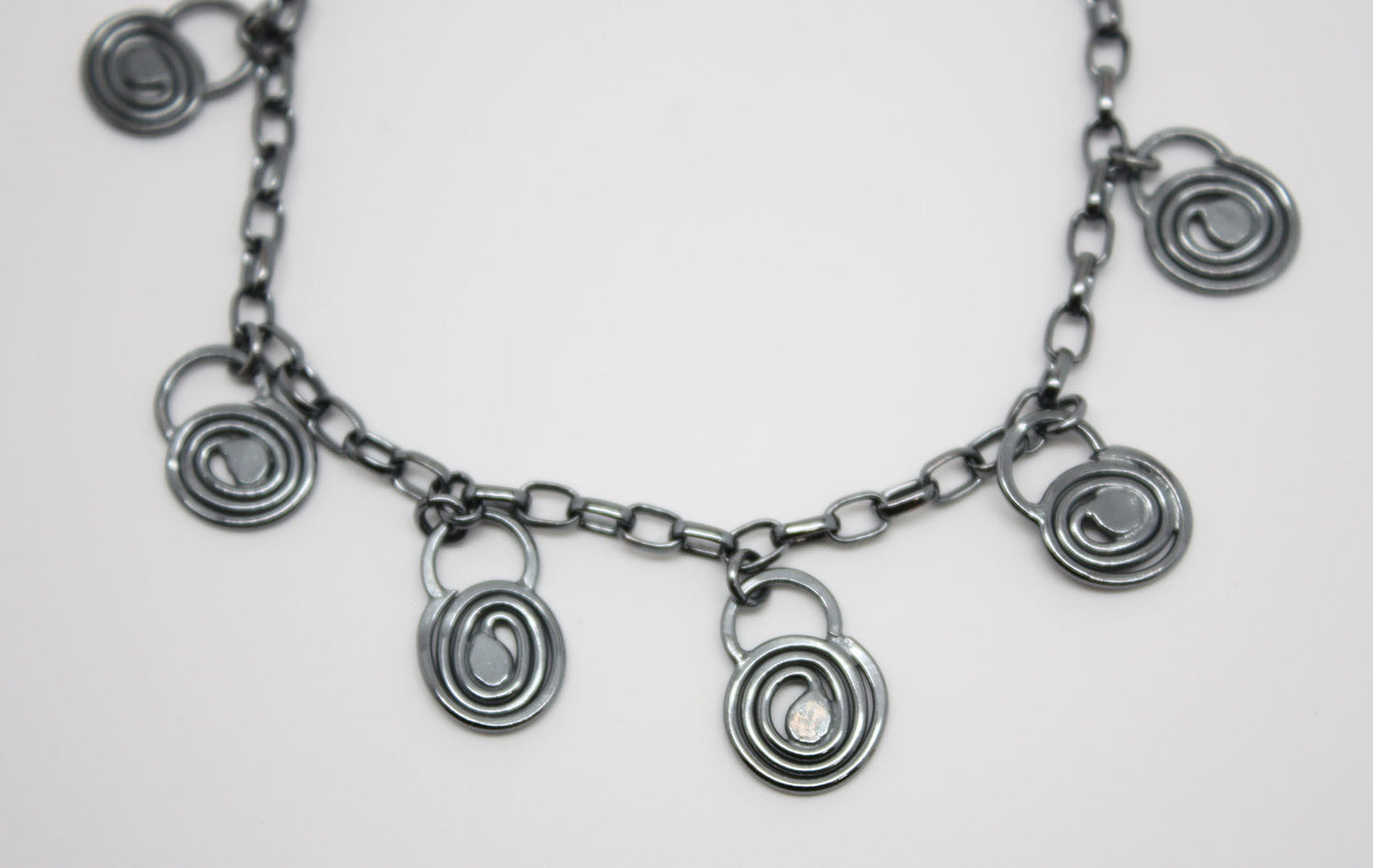 Silver Spiral Charm Bracelet-Adjustable to 7.75" 