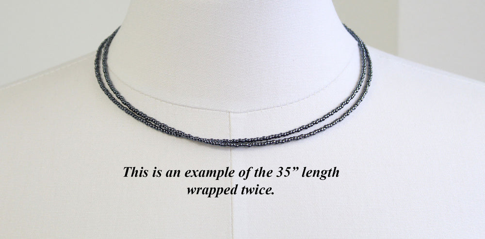 
                      
                        Hematite Glass Seed Bead Necklace
                      
                    