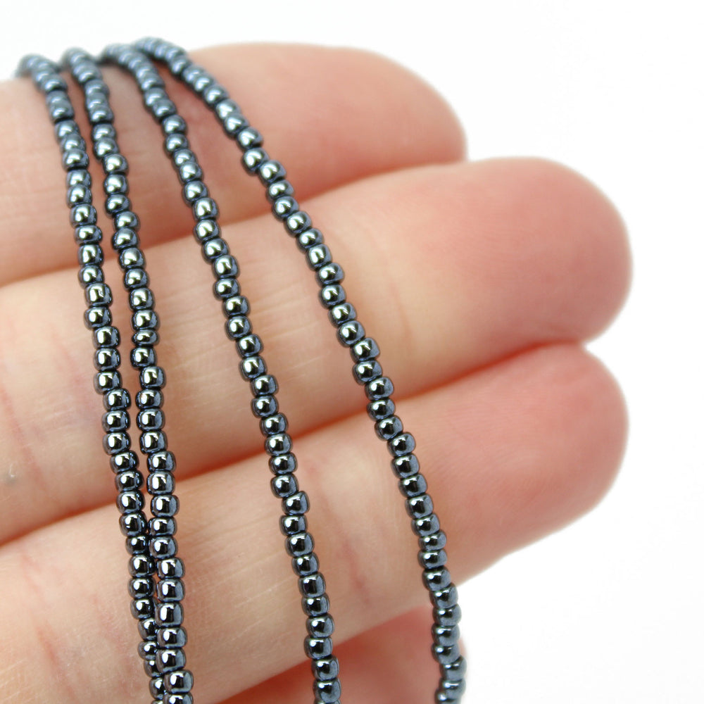 
                      
                        Hematite Glass Seed Bead Necklace
                      
                    