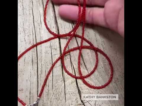 Load and play video in Gallery viewer, Transparent Siam Ruby Red Seed Bead Necklace, Thin 1.5mm Single Strand
