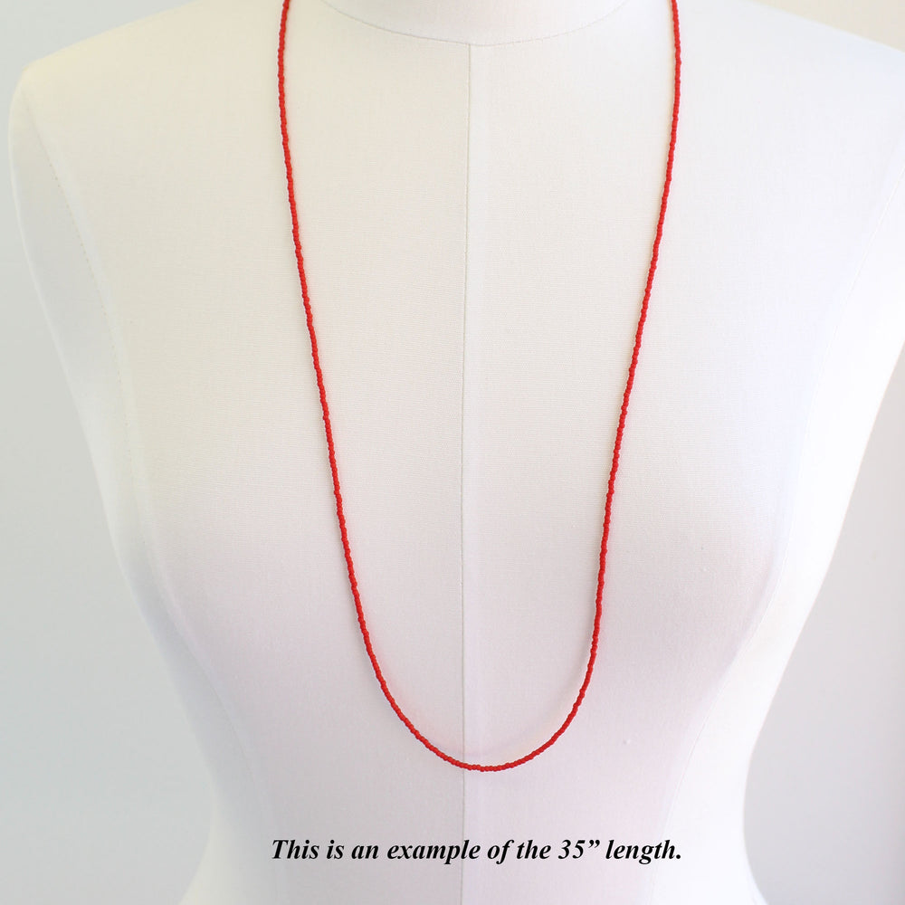 
                      
                        Red Seed Bead Necklace-Matte-Single Strand
                      
                    