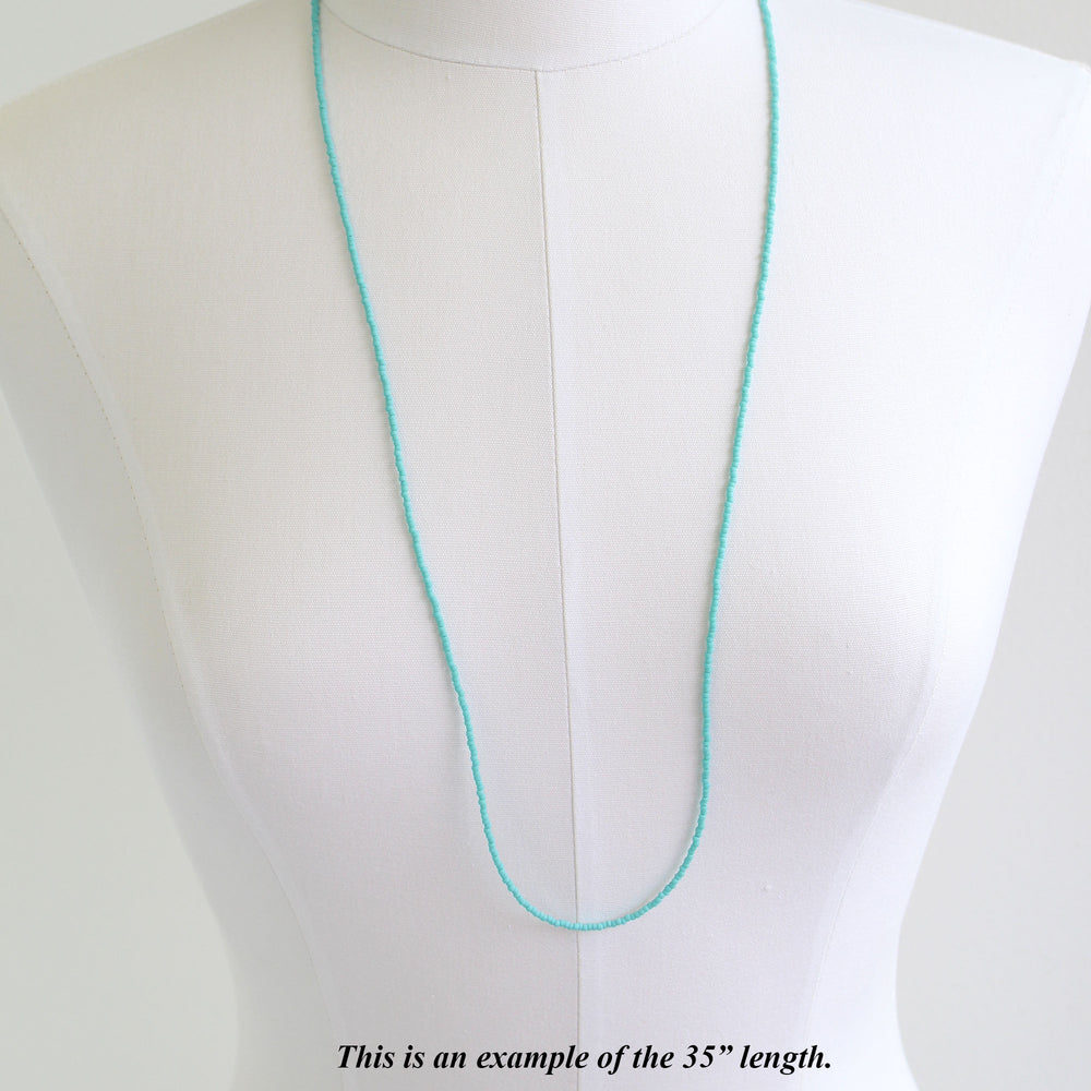 
                      
                        Long Turquoise Seed Bead Necklace- Matte Finish
                      
                    