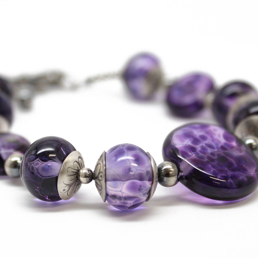 
                      
                        Purple Lampwork Bead Bracelet in Sterling Silver, Adjustable 8 to 9.25 Inches
                      
                    