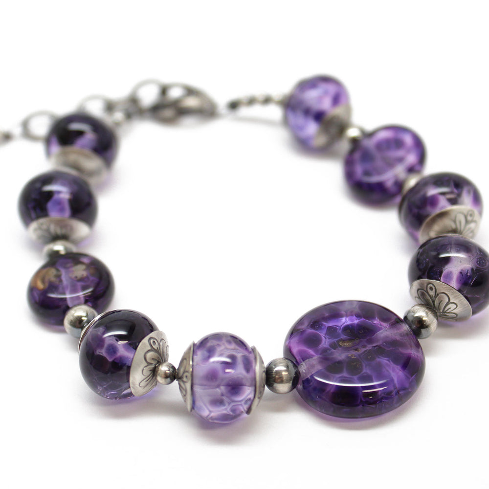
                      
                        Purple Lampwork Bead Bracelet in Sterling Silver, Adjustable 8 to 9.25 Inches
                      
                    