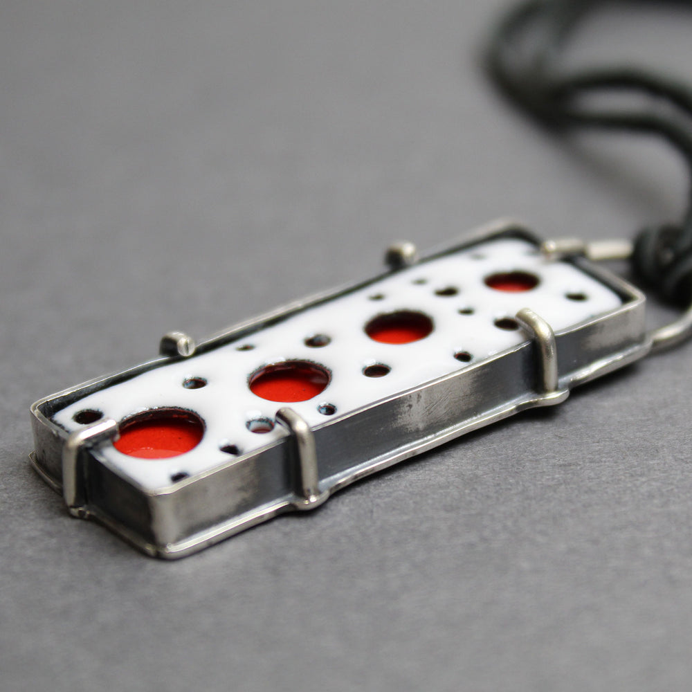 
                      
                        Rectangular Red and White Enamel Pendant in Sterling Silver
                      
                    