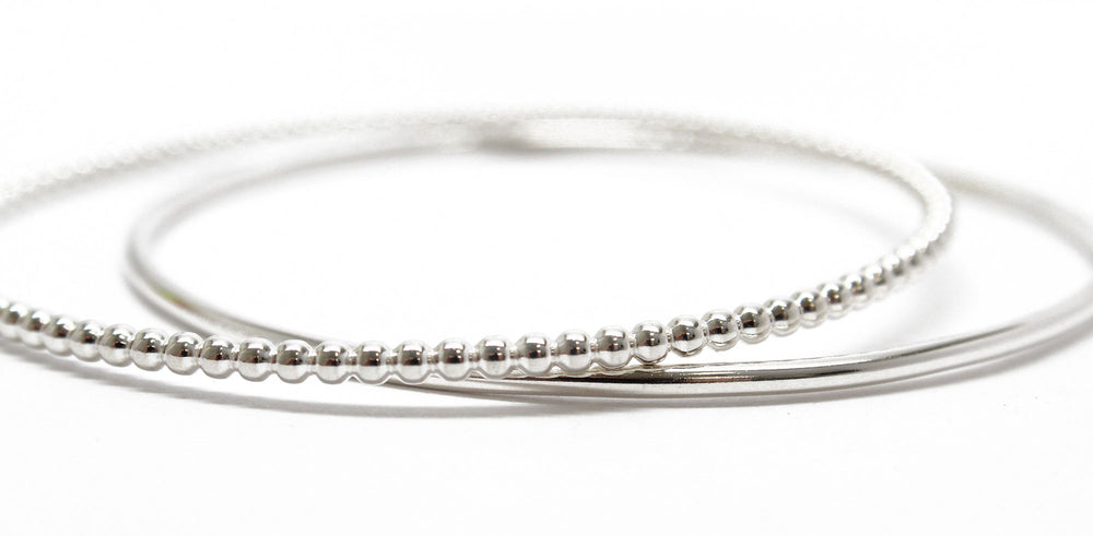 
                      
                        Sterling Silver Bangle Set
                      
                    