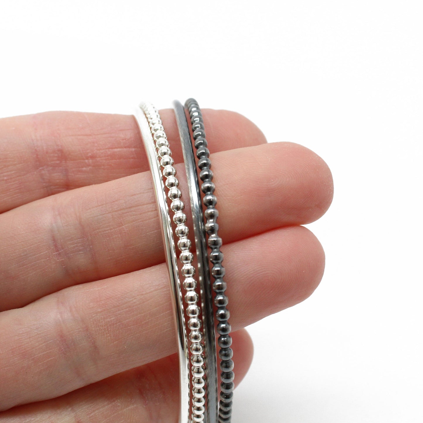 Sterling Silver Spinner Bangle With Two Spinners -   Silver bracelets,  Sterling silver bracelets, Sterling silver bangles