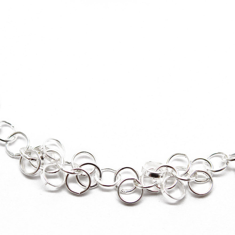 
                      
                        Sterling Silver Chain Bracelet with alternating extra links.
                      
                    