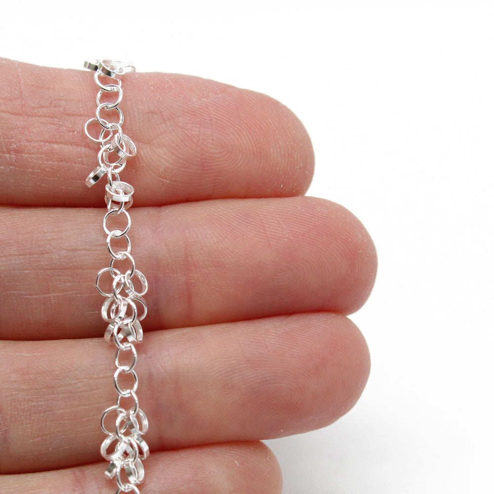
                      
                        Sterling Silver Chain Bracelet with alternating extra links.
                      
                    